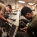 Abraham Lincoln Sailors conduct aircraft maintenance