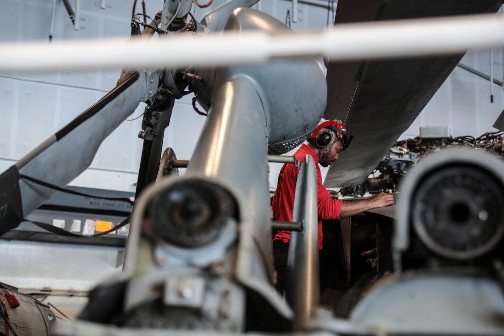 Abraham Lincoln Sailors conduct aircraft maintenance