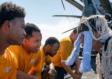 USS Arlington Sailors and Marines participate in Arctic Circle ceremony
