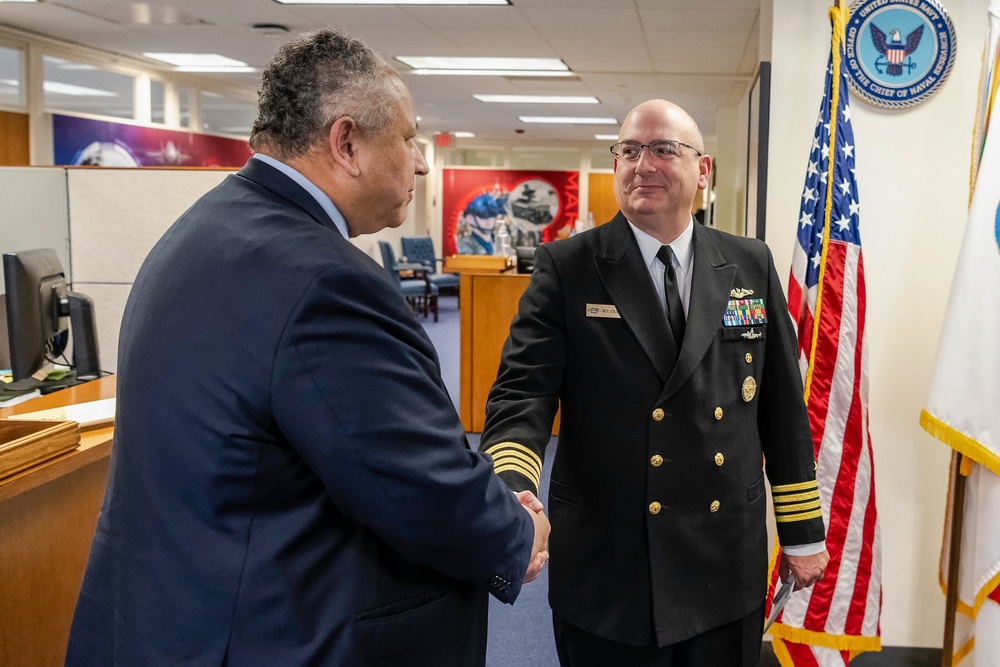 Assistant Chief of Naval Research Capt. Neil Colston welcomes Secretary of the Navy Carlos Del Toro to ONR