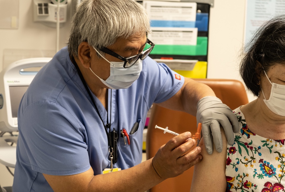 Tripler Nurse Administers COVID-19 Booster, May 2022