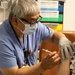 Tripler Nurse Administers COVID-19 Booster, May 2022