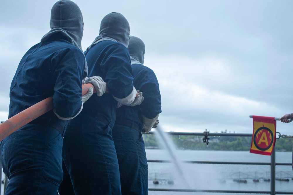 Sailors Conduct Drills On Fantail