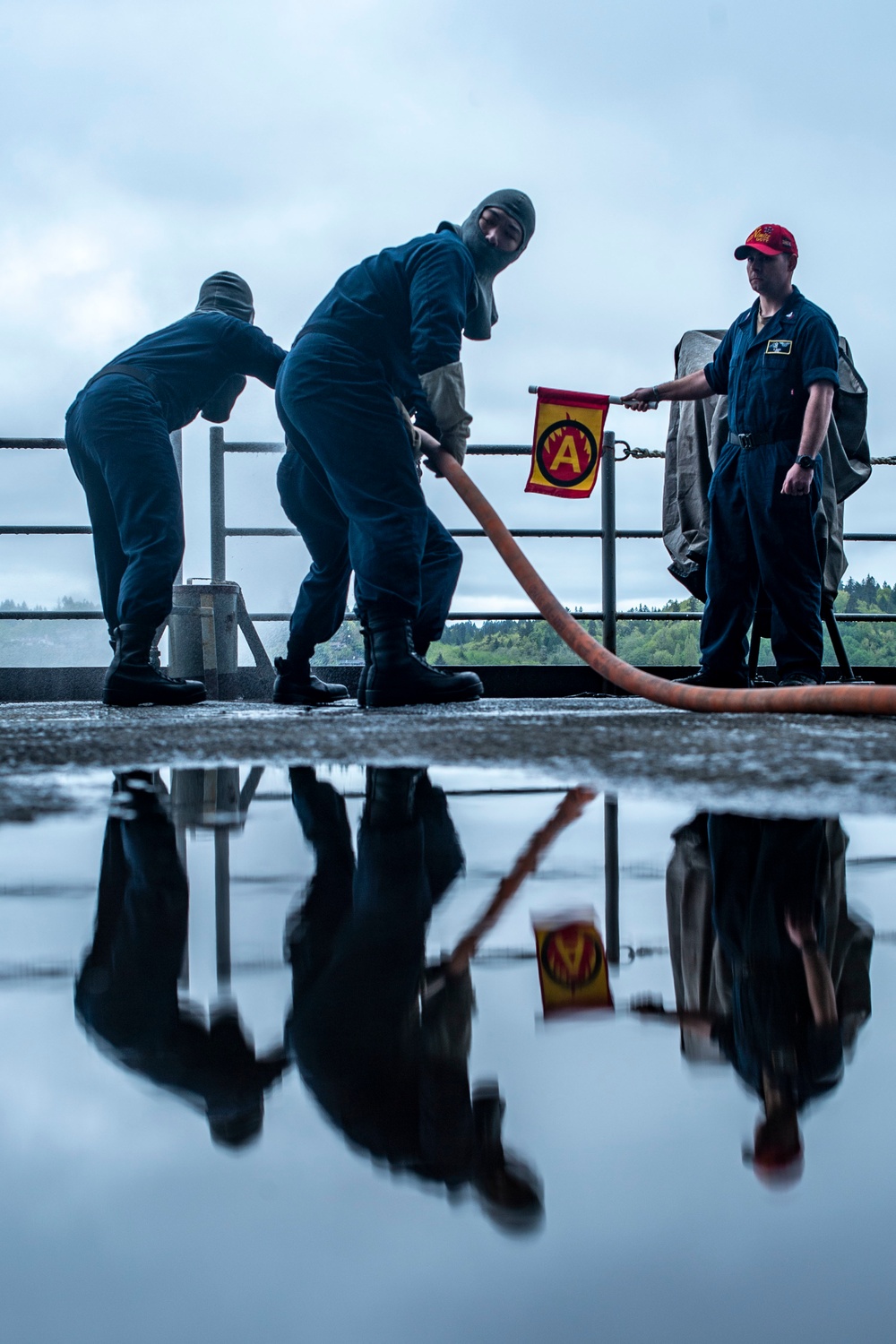 Sailors Conduct Drills On Fantail