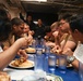 Mobile Bay Sailors compete in a pancake eating contest