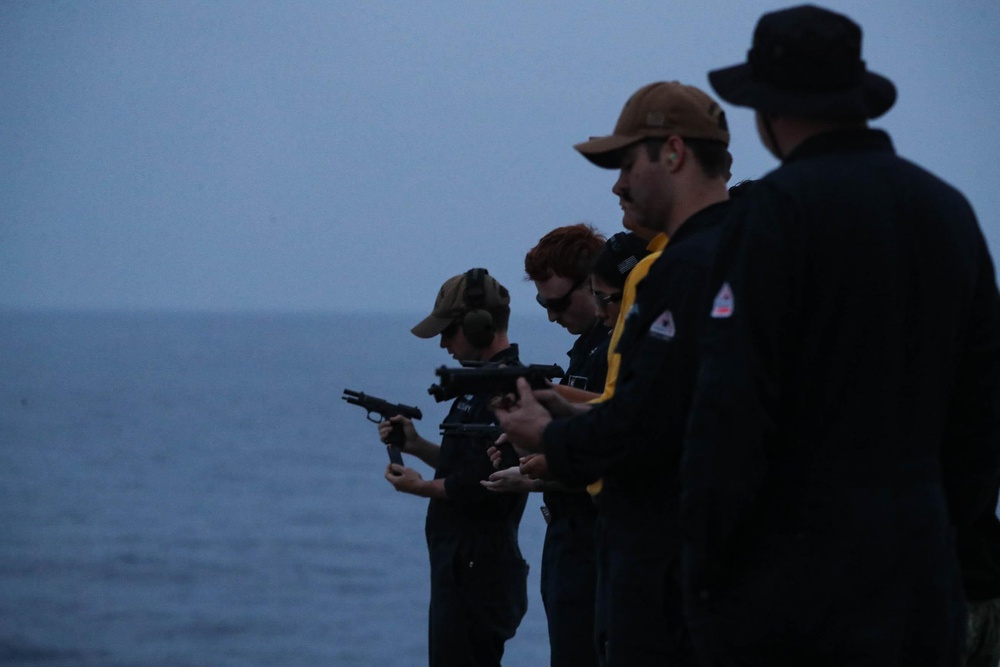 Mobile Bay conducts low-light small arms gun shoot