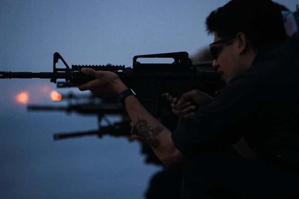 Mobile Bay conducts low-light small arms gun shoot