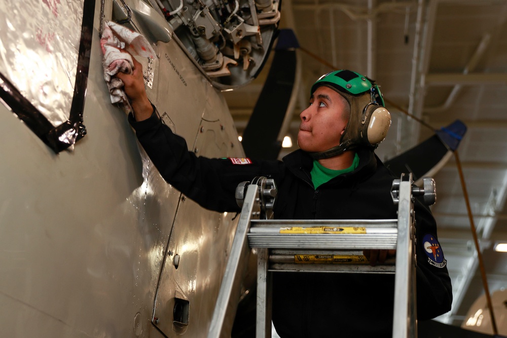 Abraham Lincoln Sailors conduct aircraft maintenance