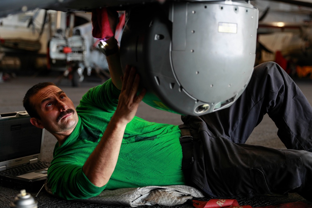 Abraham Lincoln Sailors conduct aircraft maintenance