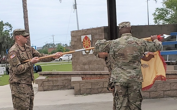 Soldiers from 904th CBN uncase their colors