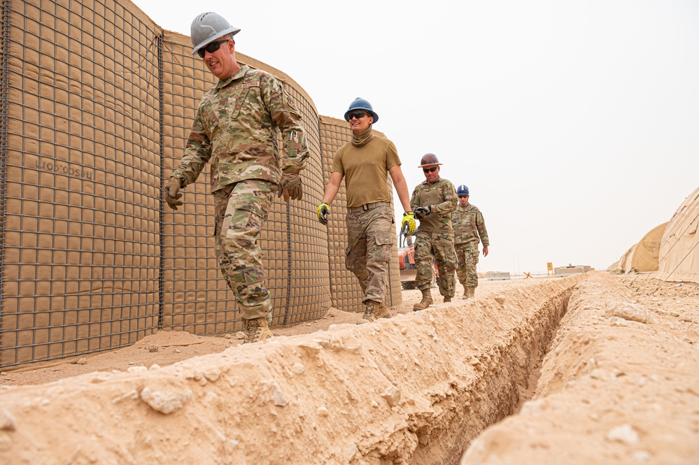 Roll Sleeves Up - 378th AEW leadership digs trenches with Comm