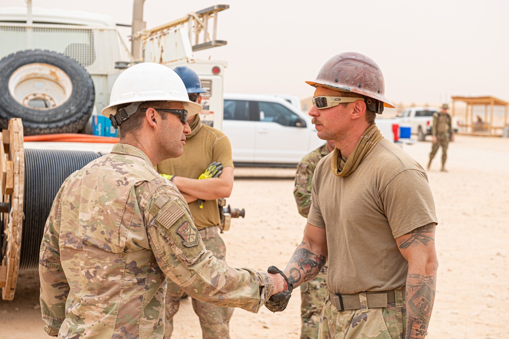 Roll Sleeves Up - 378th AEW leadership digs trenches with Comm