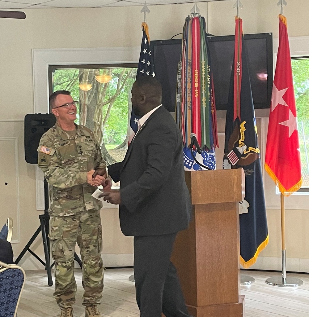 Gen Paul E. Funk II speaks to members of HRC ROCKS, Inc.