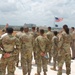 Fort Hood Soldier reenlists on top of the III Corps Headquarters