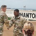 Fort Hood Soldier reenlists on top of the III Corps Headquarters