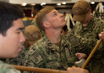 Sailors Maintain Ship