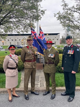 AWC colleagues gather at dawn to honor the ANZAC