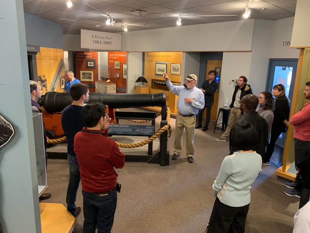 Museum volunteer leads guided tour