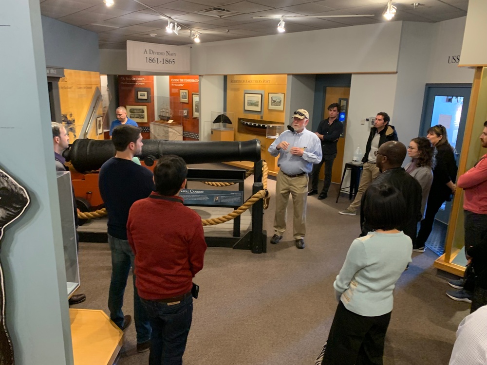 Museum volunteer leads guided tour