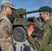 Slovakian NATO EFP soldiers demonstrate equipment to U.S. Soldiers