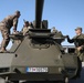 Slovakian NATO EFP soldiers demonstrate equipment to U.S. Soldiers