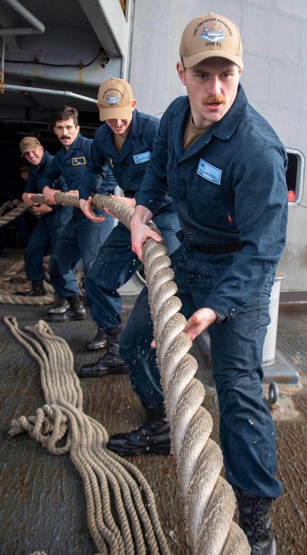 Sailors Heave Into Line