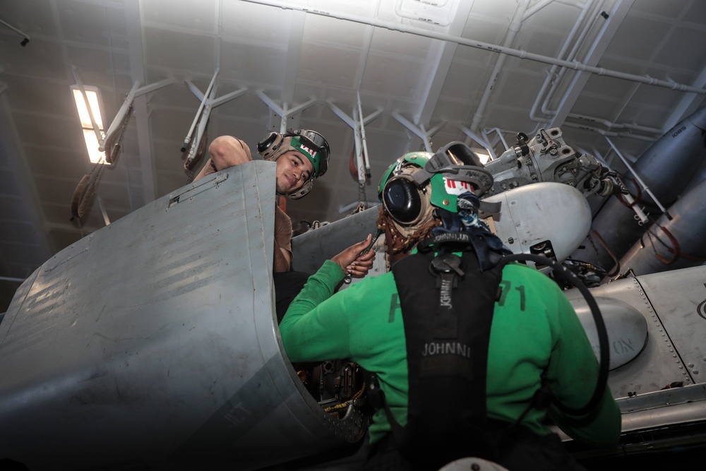 Abraham Lincoln Sailors conduct aircraft maintenance
