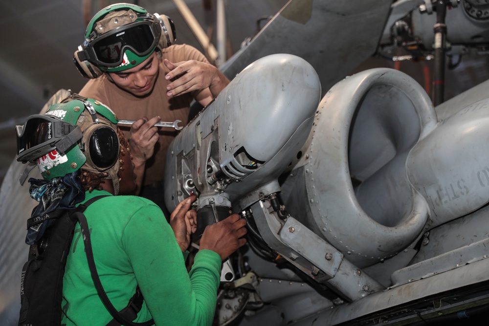 Abraham Lincoln Sailors conduct aircraft maintenance