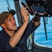 USS Jackson (LCS 6) Sailor Conducts Maintenance