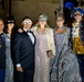 Guests pose for a photo during the VMC Masquerade Gala