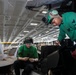 Abraham Lincoln Sailors conduct aircraft maintenance