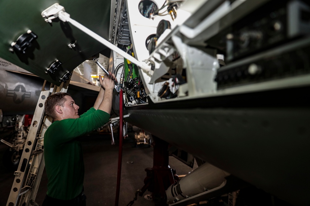 Abraham Lincoln Sailors conduct aircraft maintenance