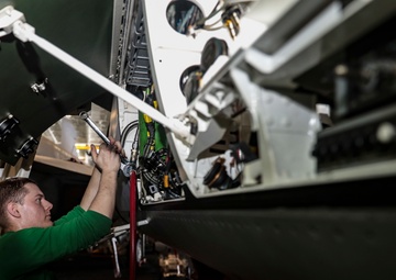 Abraham Lincoln Sailors conduct aircraft maintenance