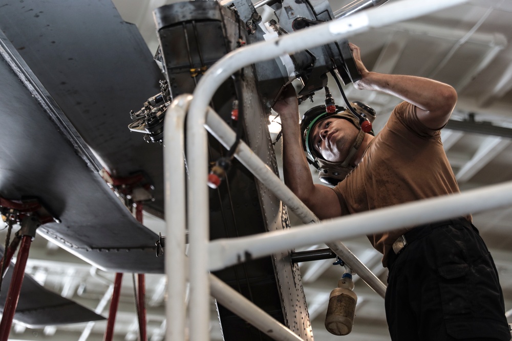 Abraham Lincoln Sailors conduct aircraft maintenance