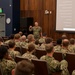 Vice Adm. Kitchener Speaks with Junior Officers