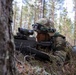 U.S. Army Soldier Pfc. Pierce English lines up his sight during Exercise Arrow 22