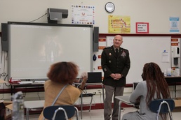 Daly challenges students to be great