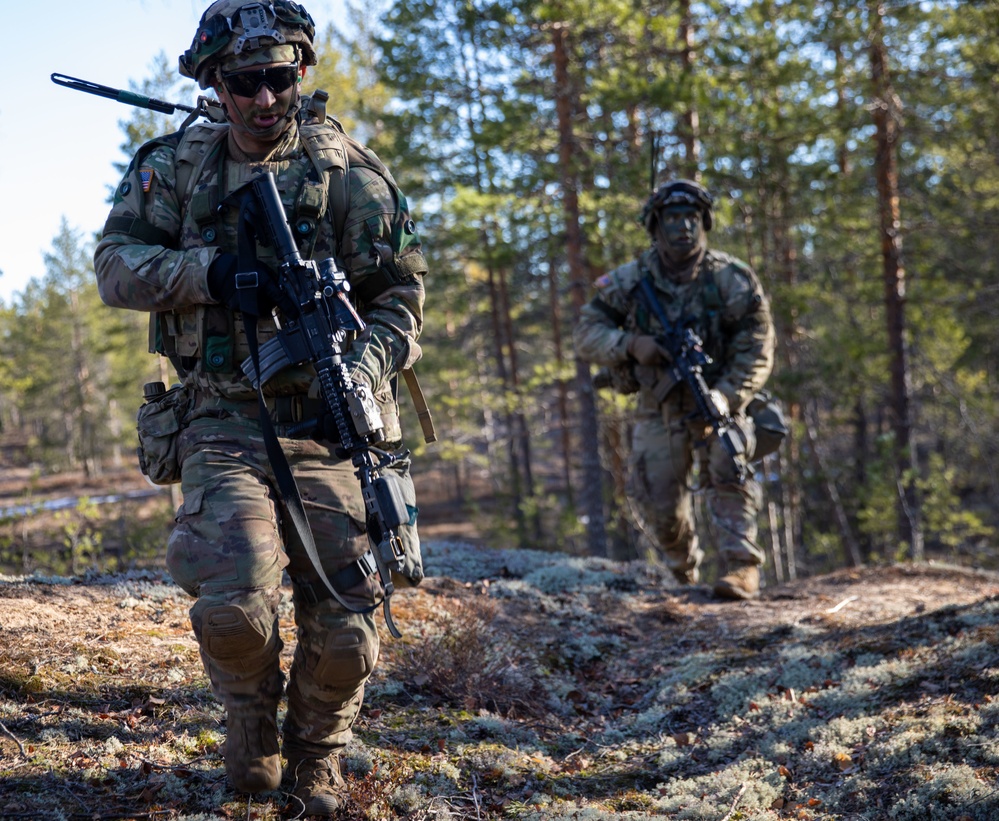 U.S. Army Soldiers move to cover during Exercise Arrow 22