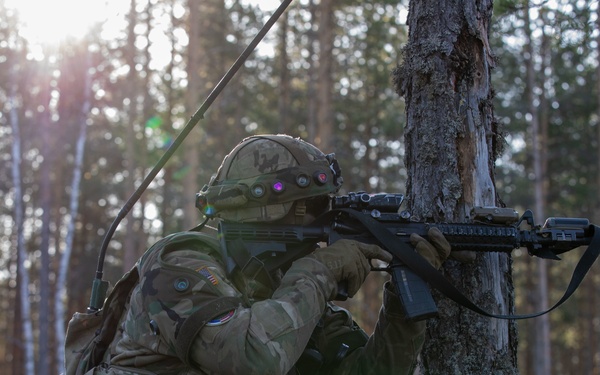 U.S. Army Sgt. Brandon Roche performs reconnaissance at Exercise Arrow 22