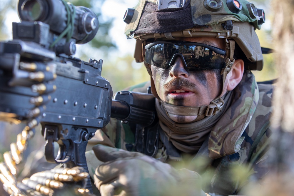 U.S. Army Cpl. Blaine Self pulls security during Exercise Arrow 22