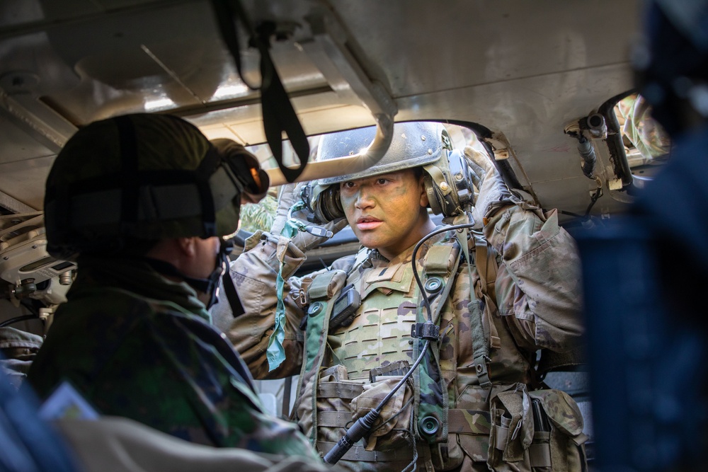 U.S. Army 1st Lt. Nicky Manzitas communicates during Exercise Arrow 22