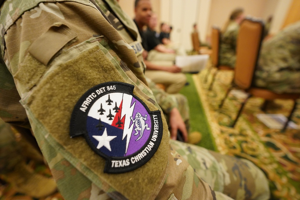 688th Cyberspace Wing officers engage with Texas Christian Academy AFROTC Cadets