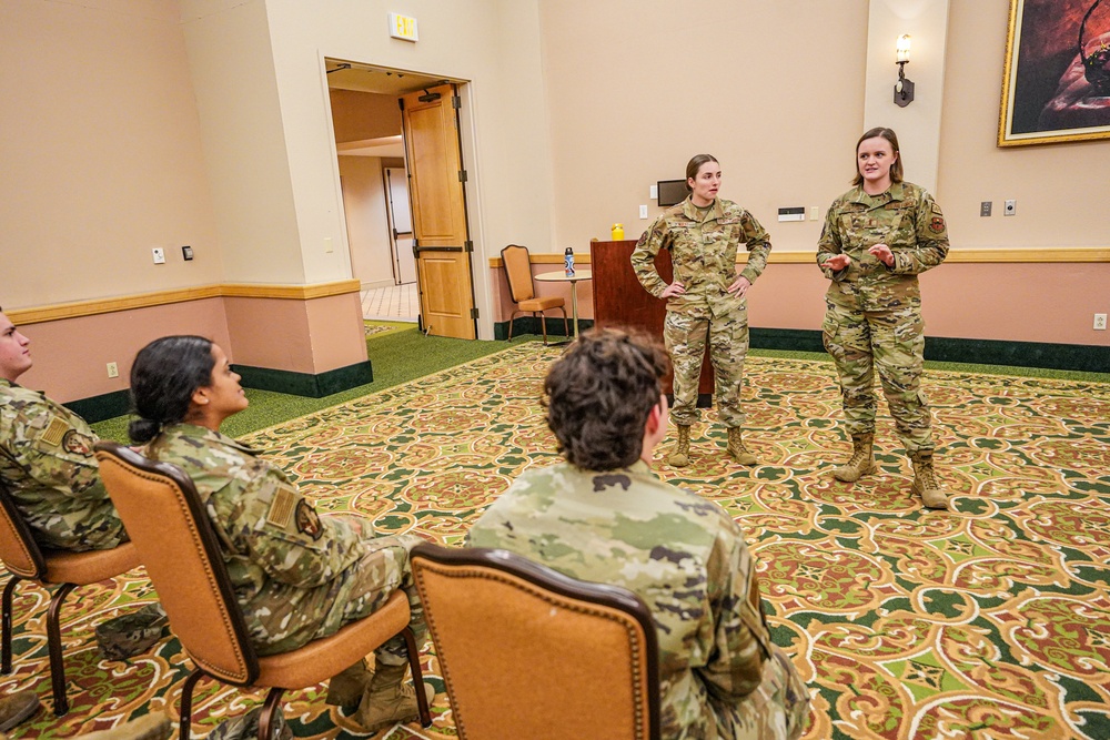 688th Cyberspace Wing officers engage with Texas Christian Academy AFROTC Cadets