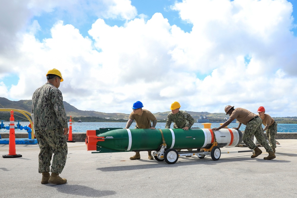 Sailors load mines on USS Annapolis