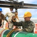 Sailors load mines on USS Annapolis