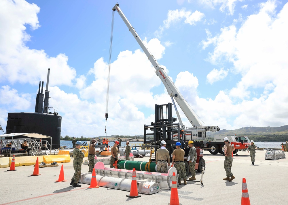 Sailors load mines on USS Annapolis