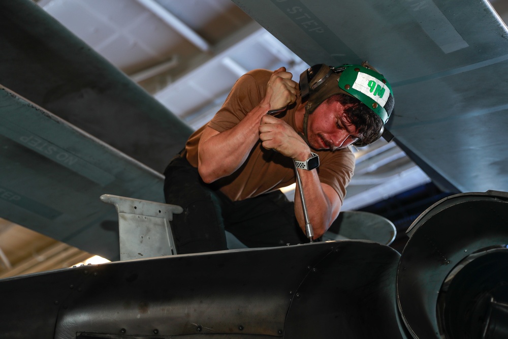 Abraham Lincoln Sailor conducts maintenance