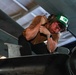 Abraham Lincoln Sailor conducts maintenance