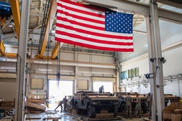 173rd Airborne Soldiers prepare equipment for drop