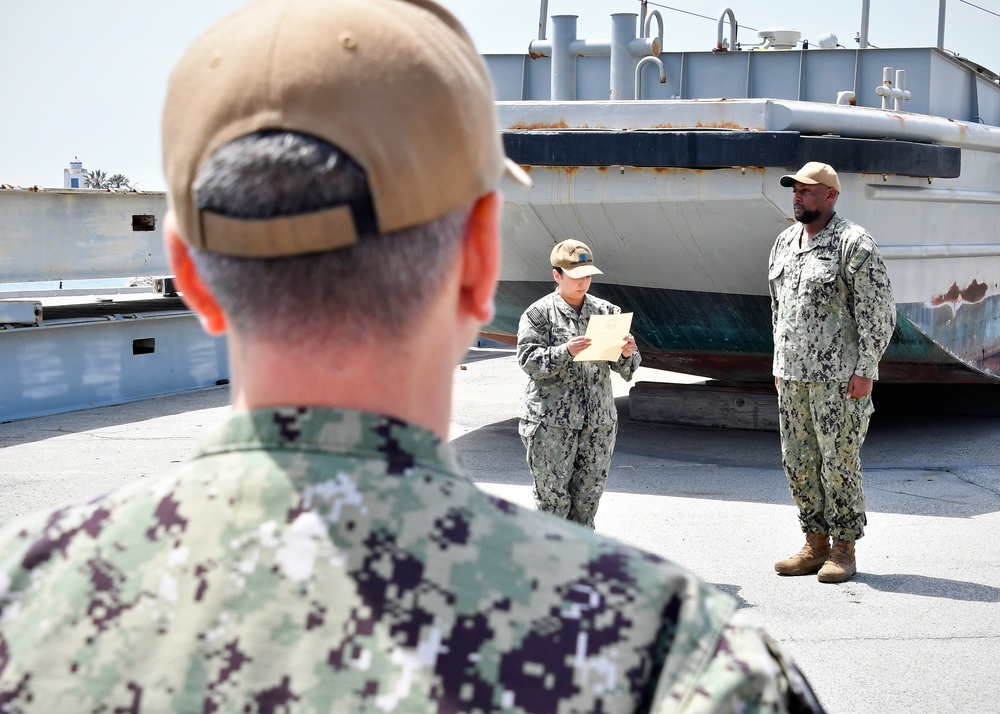 Port-Ops Sailor reenlists onboard Port Hueneme